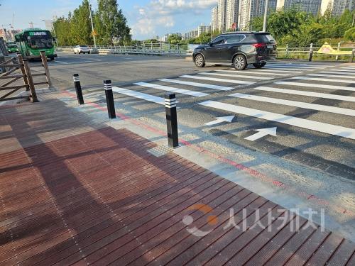 f_3. 넓어진 횡단보도·바닥신호등으로 버드내중학교 삼거리  학생 안전 강화1.jpg